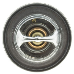 MotoRad thermostat installed in engine housing demonstrating direct-fit benefit