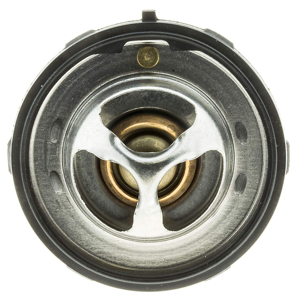 MotoRad thermostat installed in engine bay demonstrating direct-fit replacement benefit