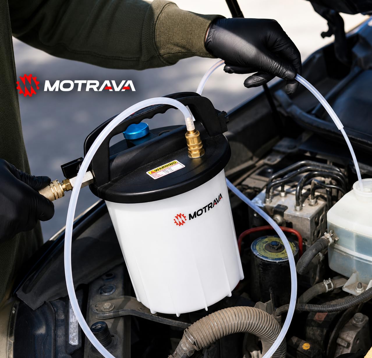 MOTRAVA bleeder in use on a car brake caliper for one-person hands-free operation