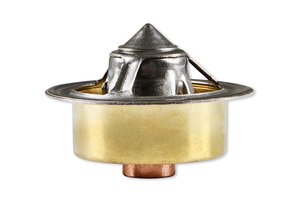 MR. G GASKET CO. 4364 beside ruler showing compact size for correct thermostat housing fit