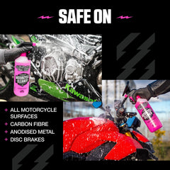 Motorcycle covered in pink Muc-Off foam showing effective dirt lifting action