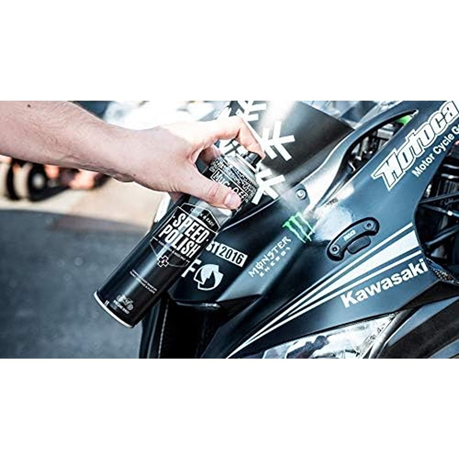 Muc-Off used on a motorcycle in driveway illustrating fast post-wash protection