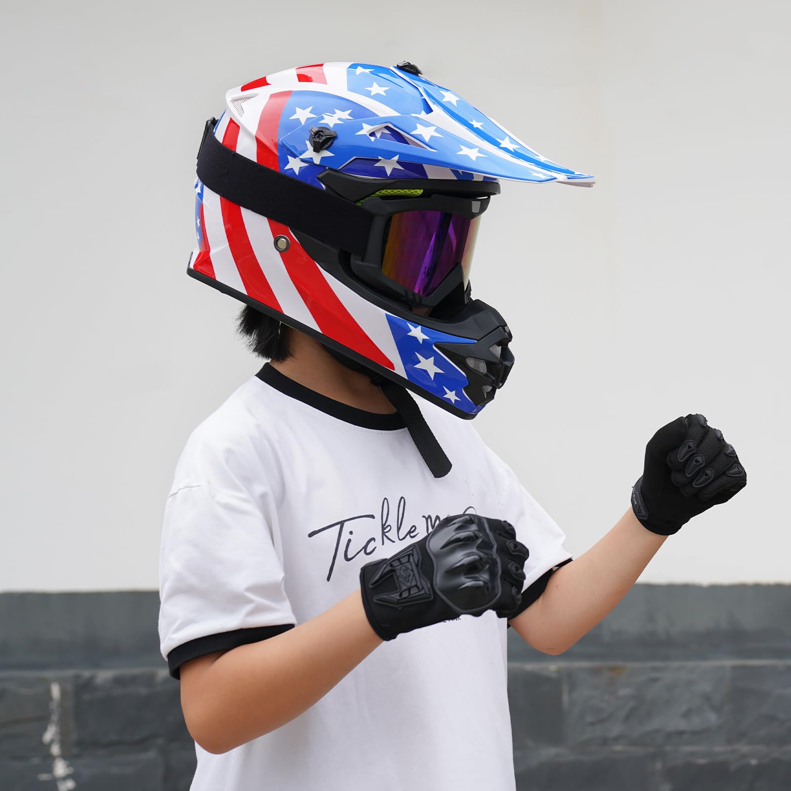 MXJ Gear helmet size comparison with child hand showing fit reference