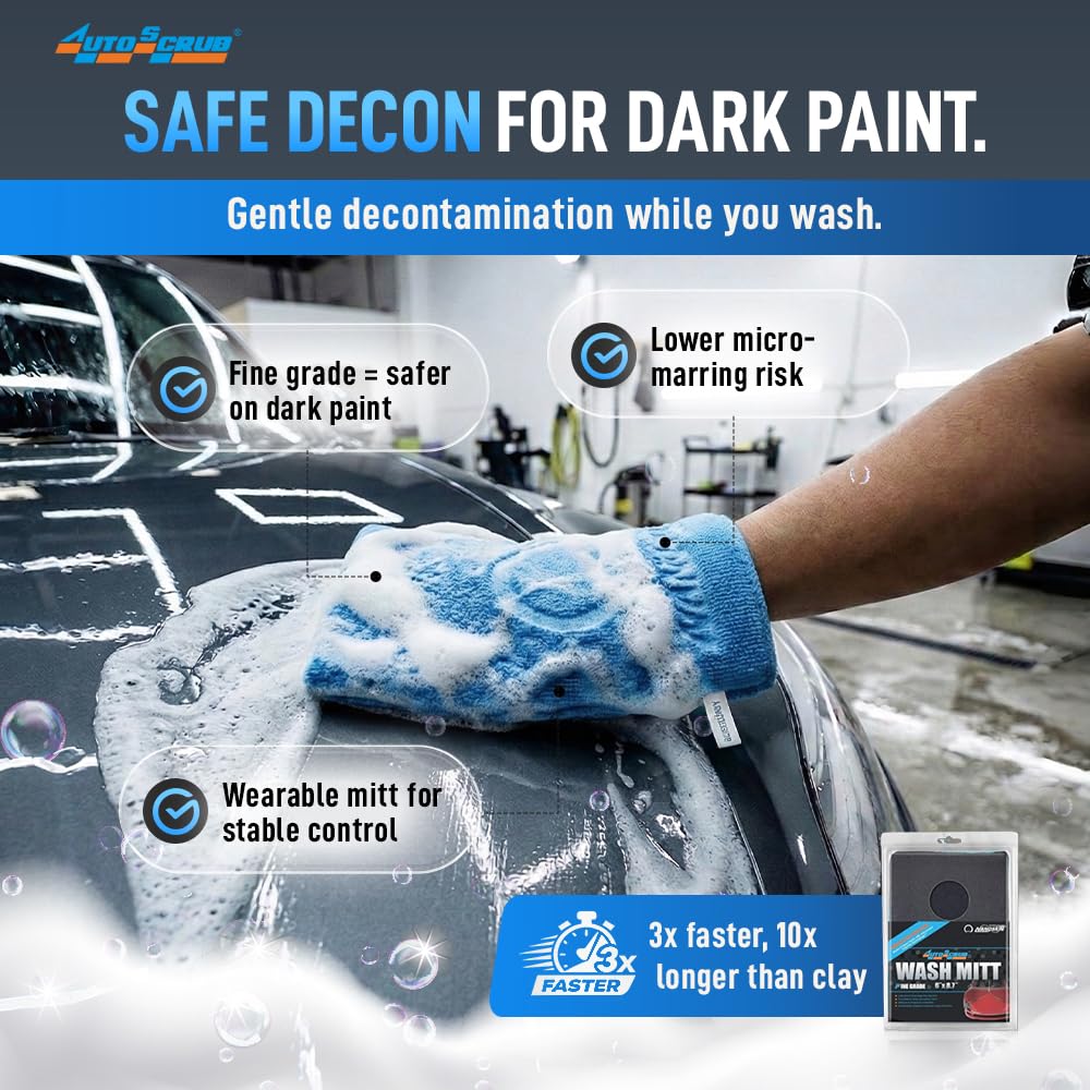 Nanoskin mitt during use on car hood showing effective contaminant removal