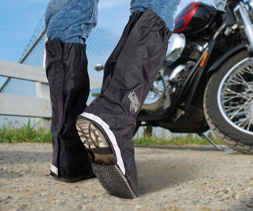 Nelson-Rigg boot covers worn on a rider, improving visibility and dry feet