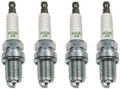 NGK BCPR5ES installed in engine cylinder head showing proper fit and improved ignition consistency