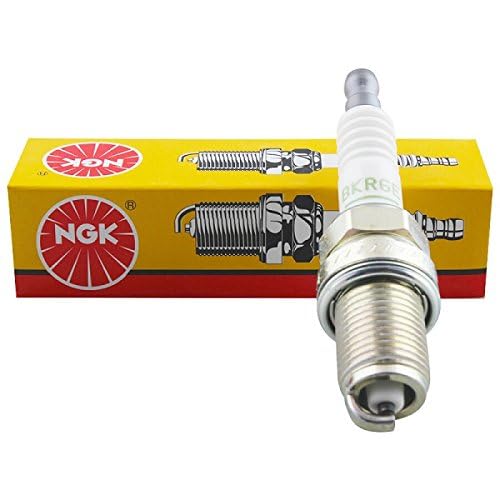 Close-up of NGK BKR6E electrode and porcelain showing precise construction for reliable spark