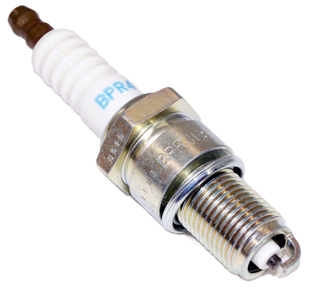 NGK plug installed in engine well demonstrating fit and ignition benefit