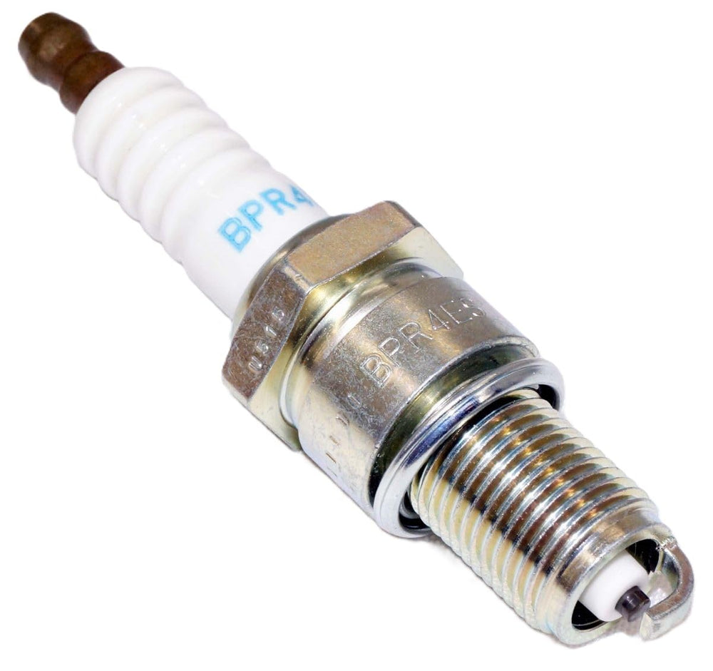 NGK plug installed in engine well demonstrating fit and ignition benefit