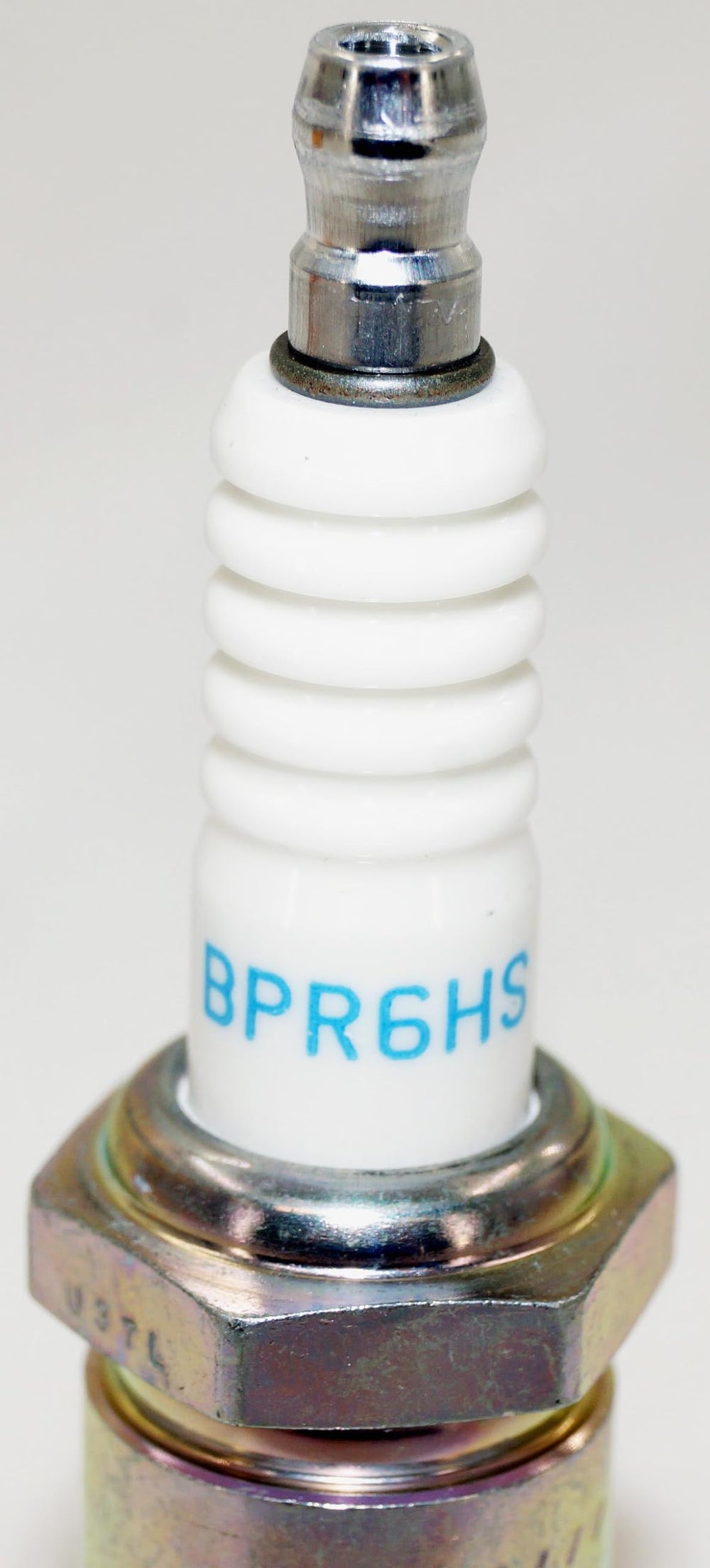 NGK BPR6HS comparison with old worn plug showing visible wear detection benefit