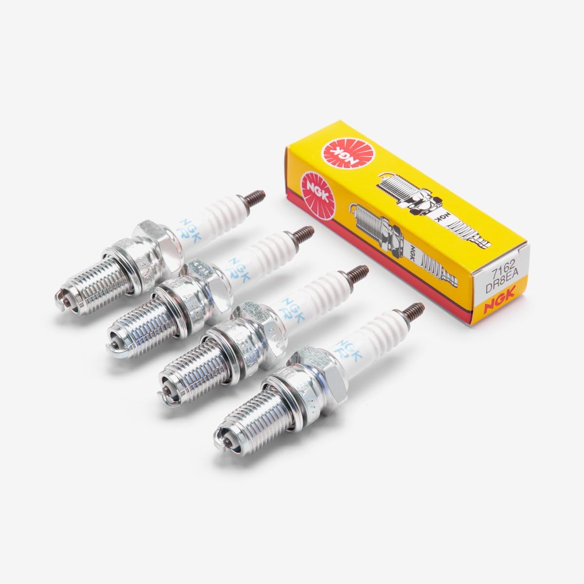 NGK DR8EA front packaging showing four genuine NGK plugs and part number for quick identification