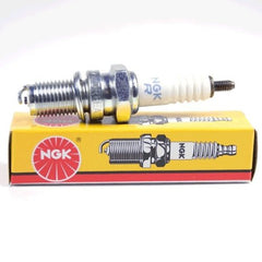 NGK DR8EA installed in engine cylinder head showing proper fit and easy replacement benefit