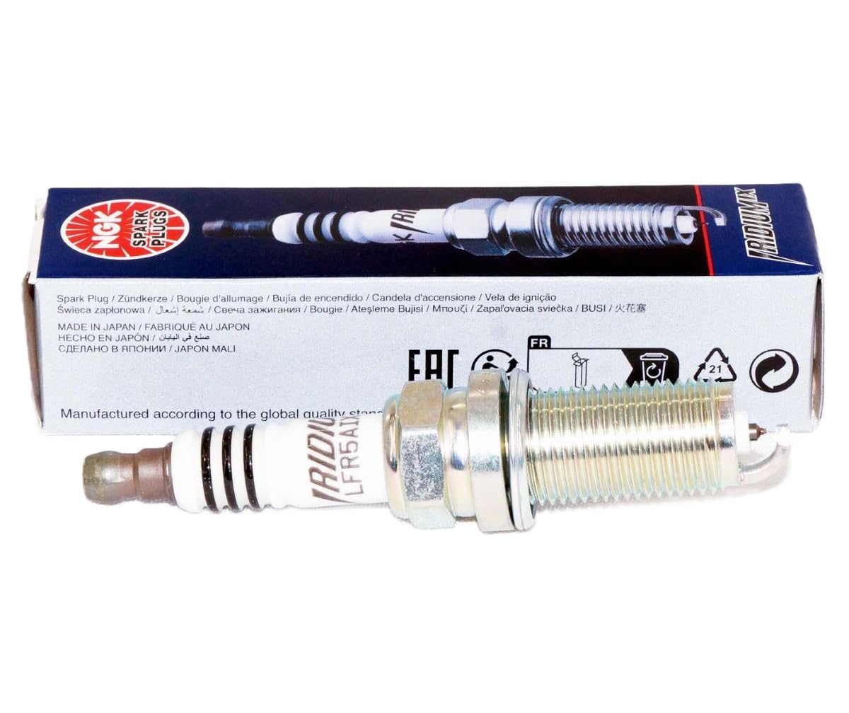 NGK iridium center electrode closeup showing fine-wire tip and improved spark