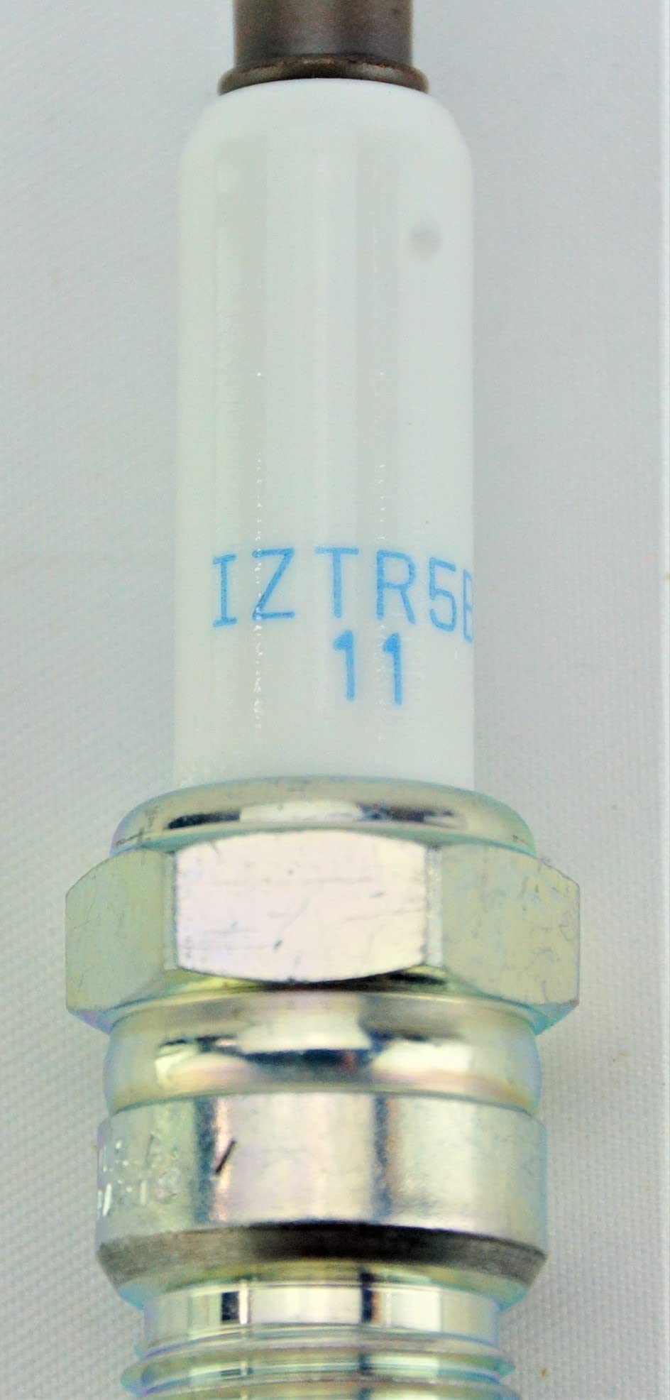 NGK IZTR5B11 installed in an engine demonstrating correct seating and dependable performance