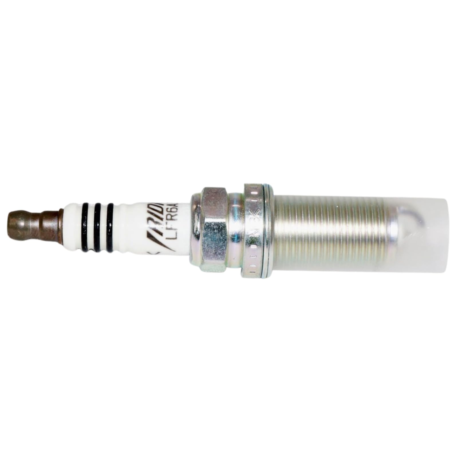 NGK spark plug installed in engine bay illustrating correct fit and improved ignition reliability