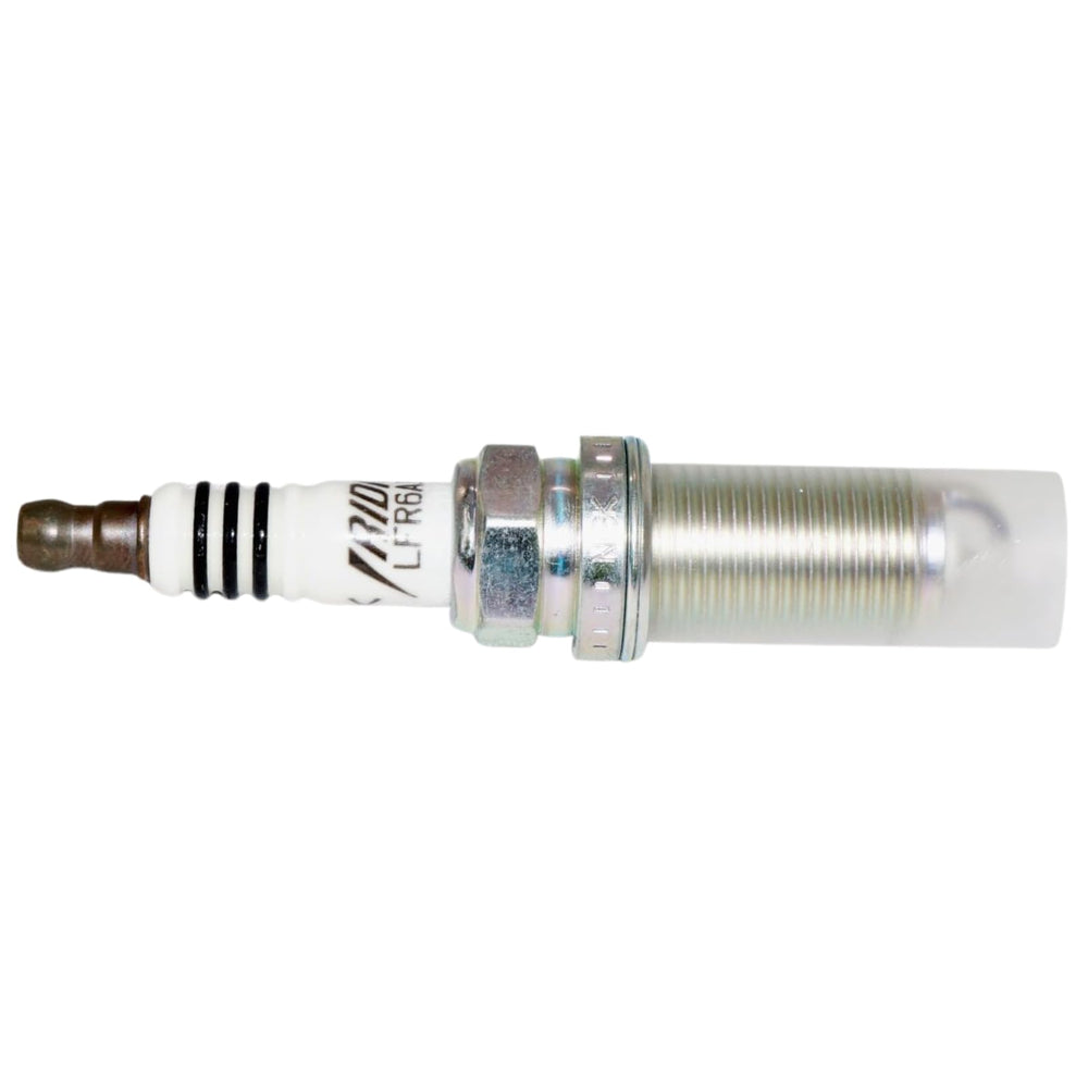 NGK spark plug installed in engine bay illustrating correct fit and improved ignition reliability