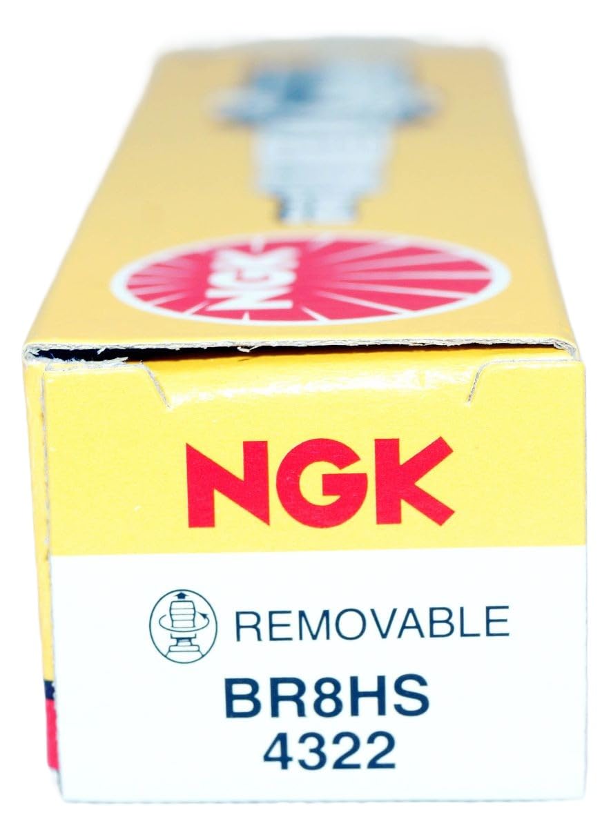 NGK spark plug next to coin showing size and easy handling benefit