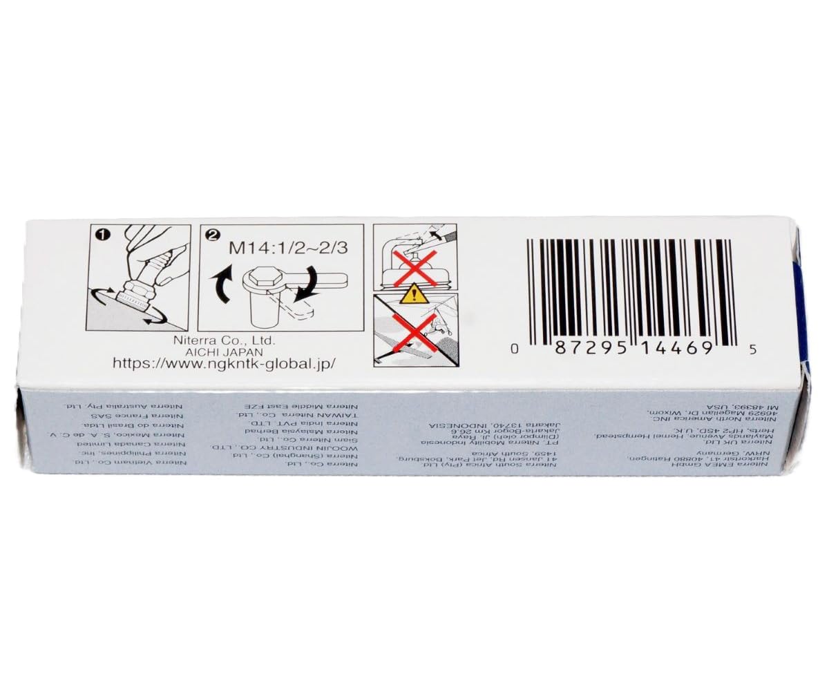 NGK six-pack laid out on cloth illustrating full kit convenience for maintenance