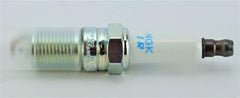 NGK spark plug installed in engine demonstrating reliable combustion performance