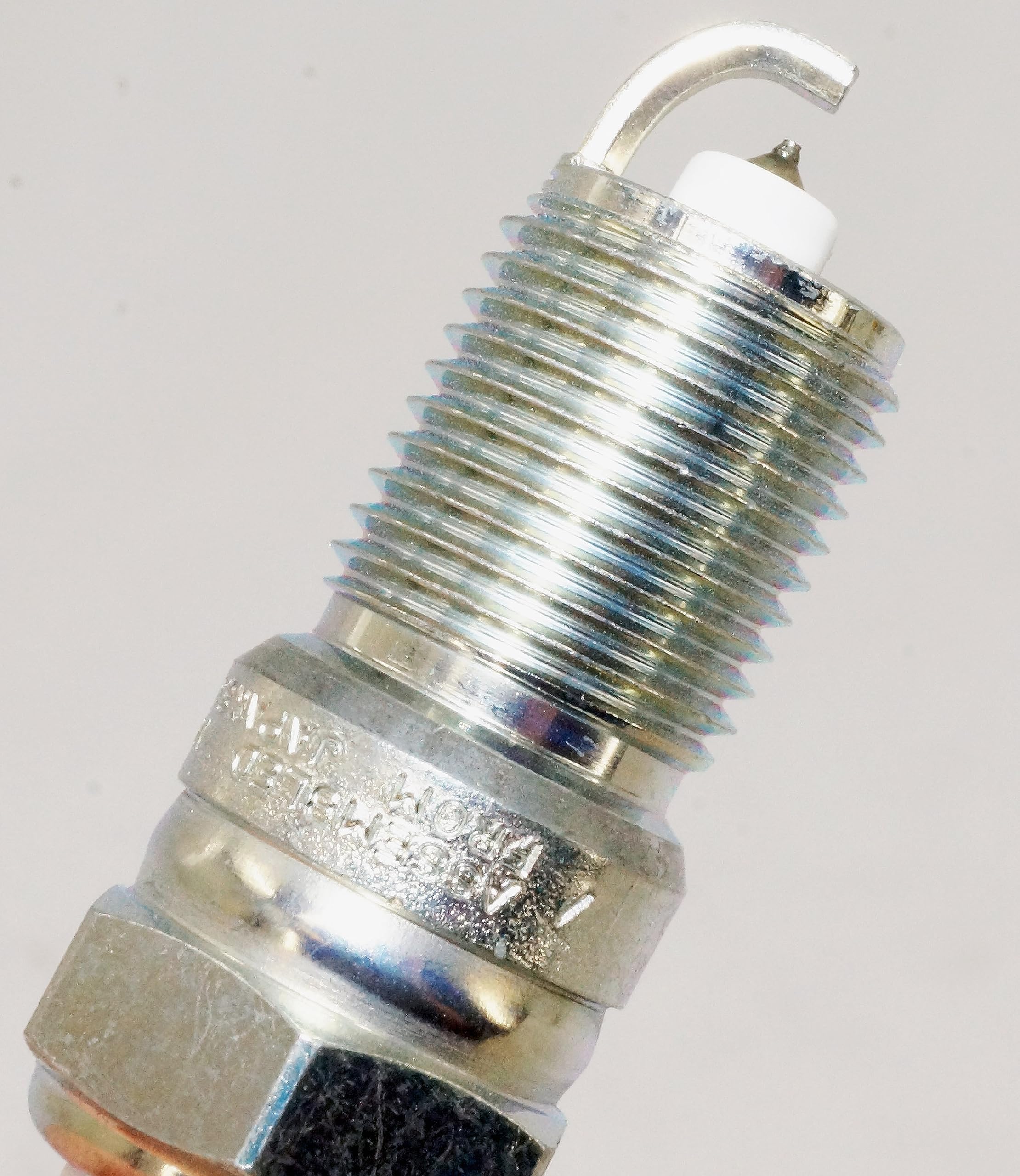 NGK TR55GP in garage setting showing ease of replacement and reliability