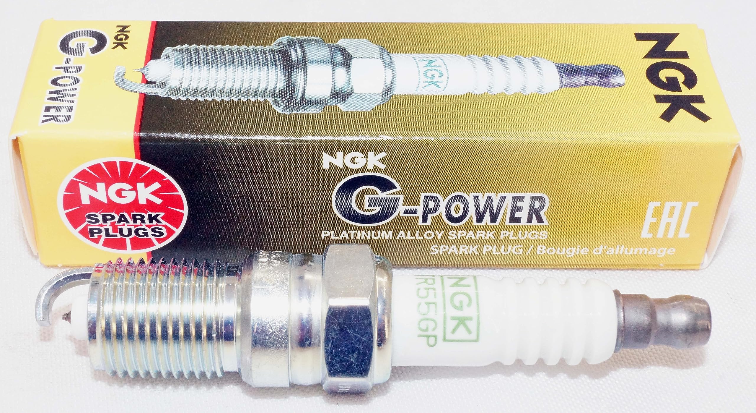 NGK TR55GP single spark plug closeup showing construction and durability