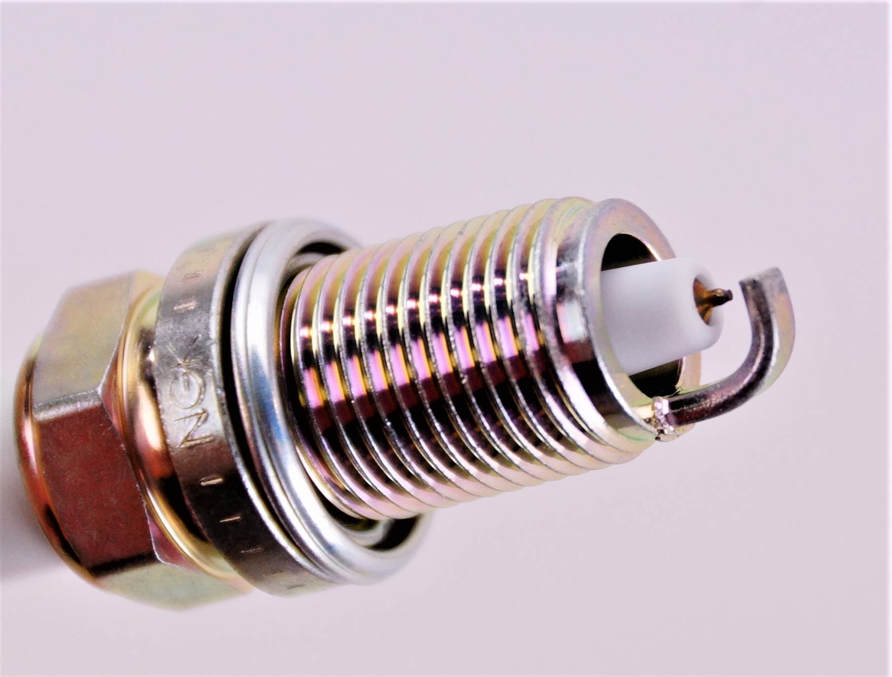 NGK spark plug thread and reach detail demonstrating correct fit and sealing