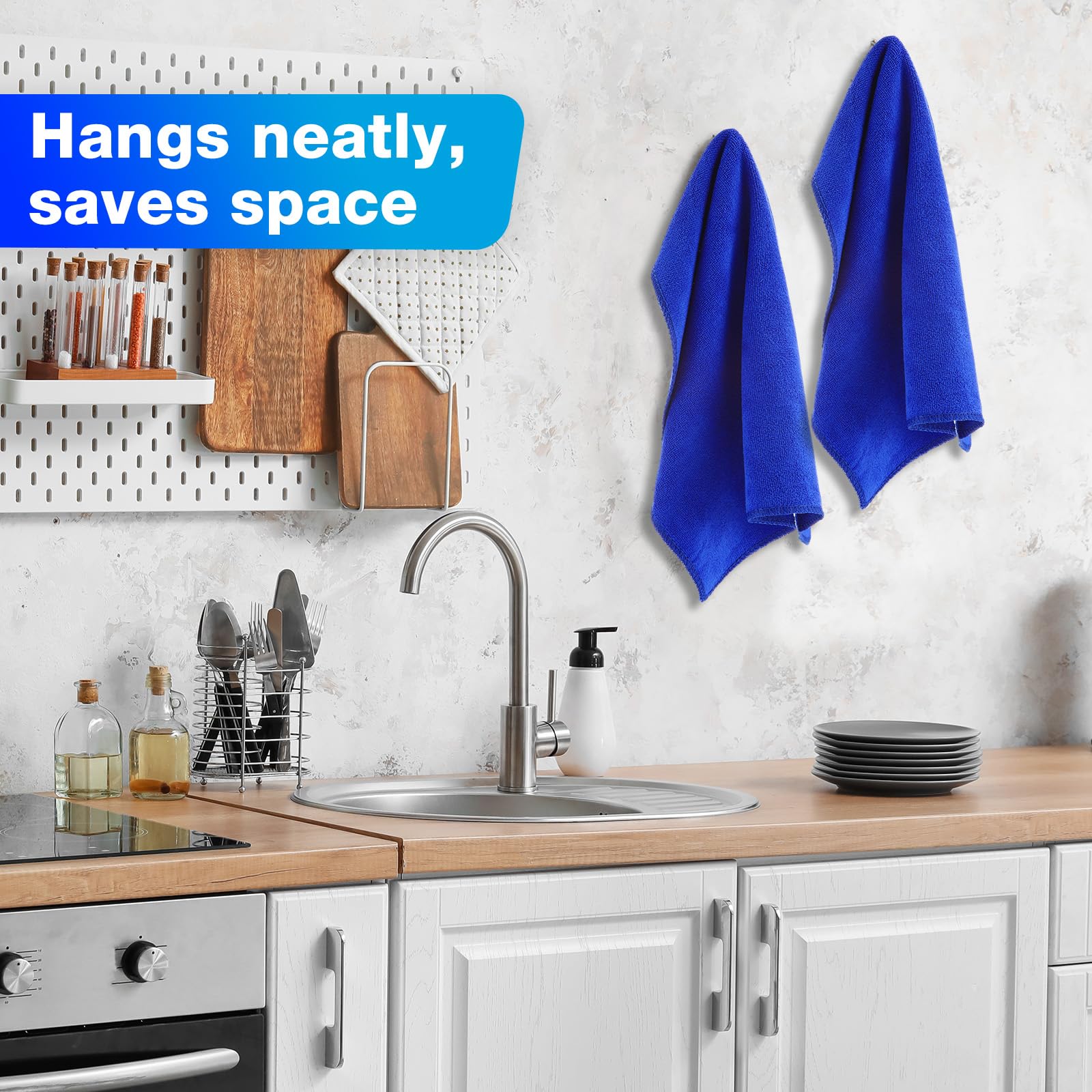 Nuenen folded stack storage shot showing compact, space-saving towel organization