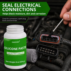 OAIEGSD brush applying grease to a connector for cleaner maintenance
