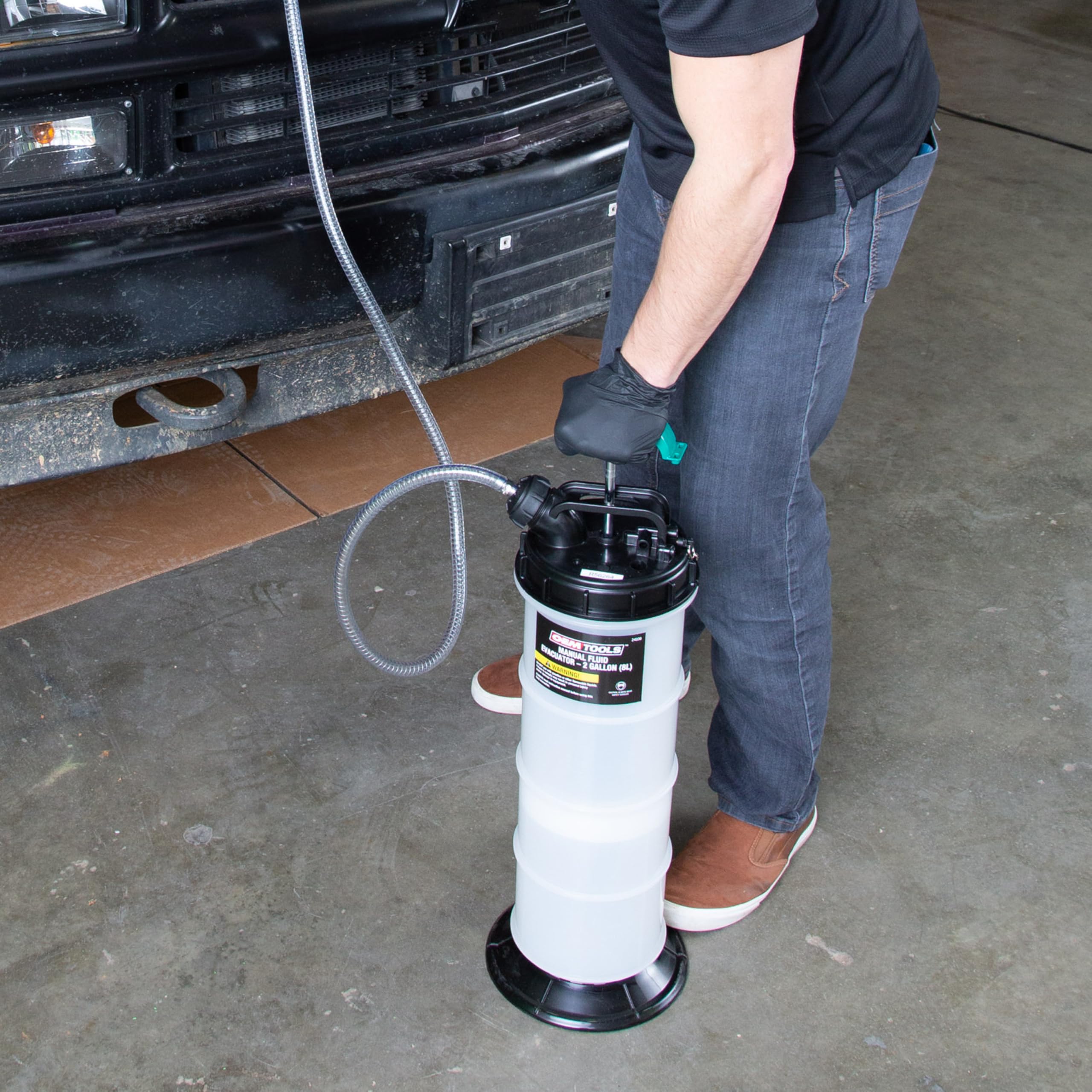 OEMTOOLS lifestyle garage setup with extractor beside tools showing ready-to-use convenience