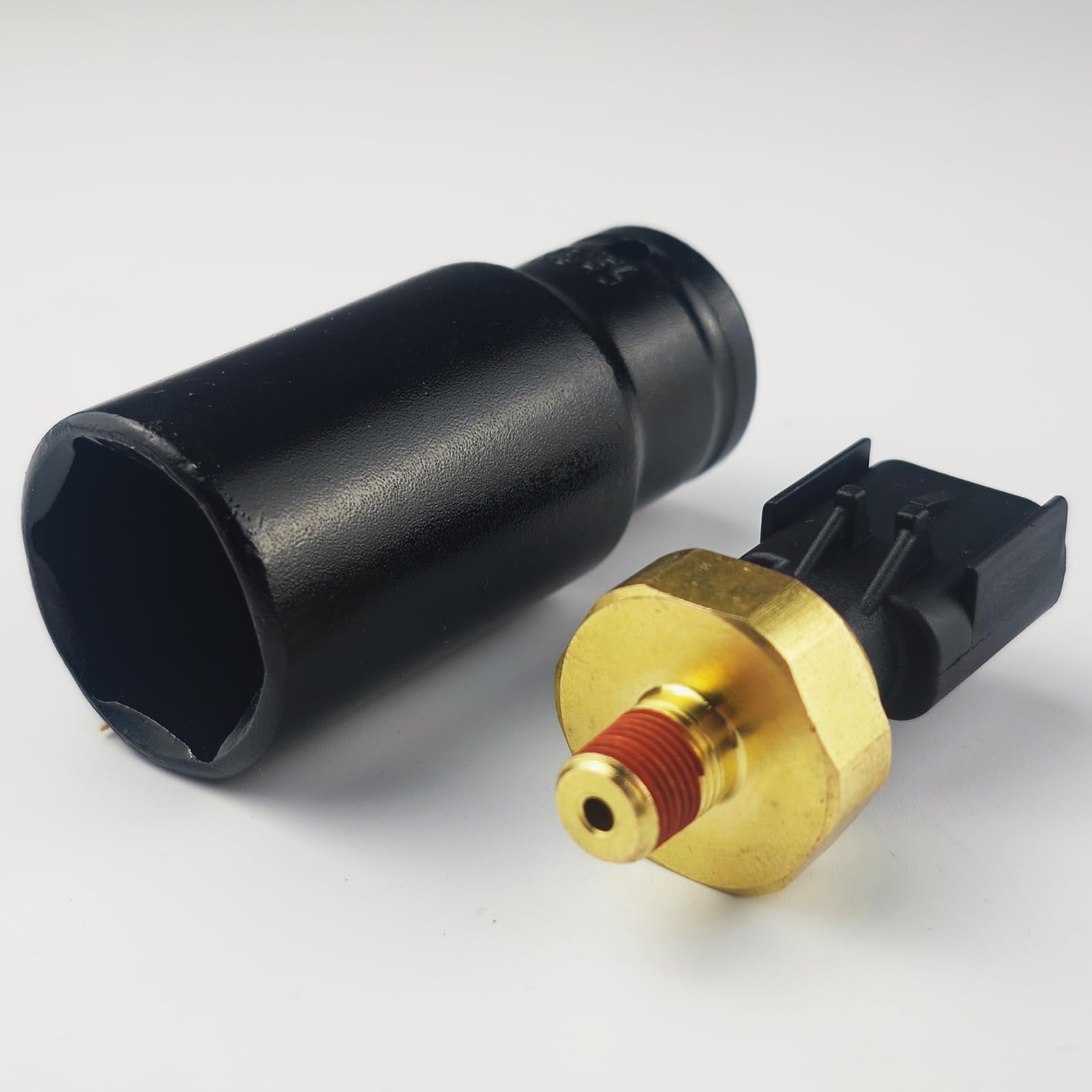 OEMUTA packaging with sensor and socket laid out, includes warranty and parts