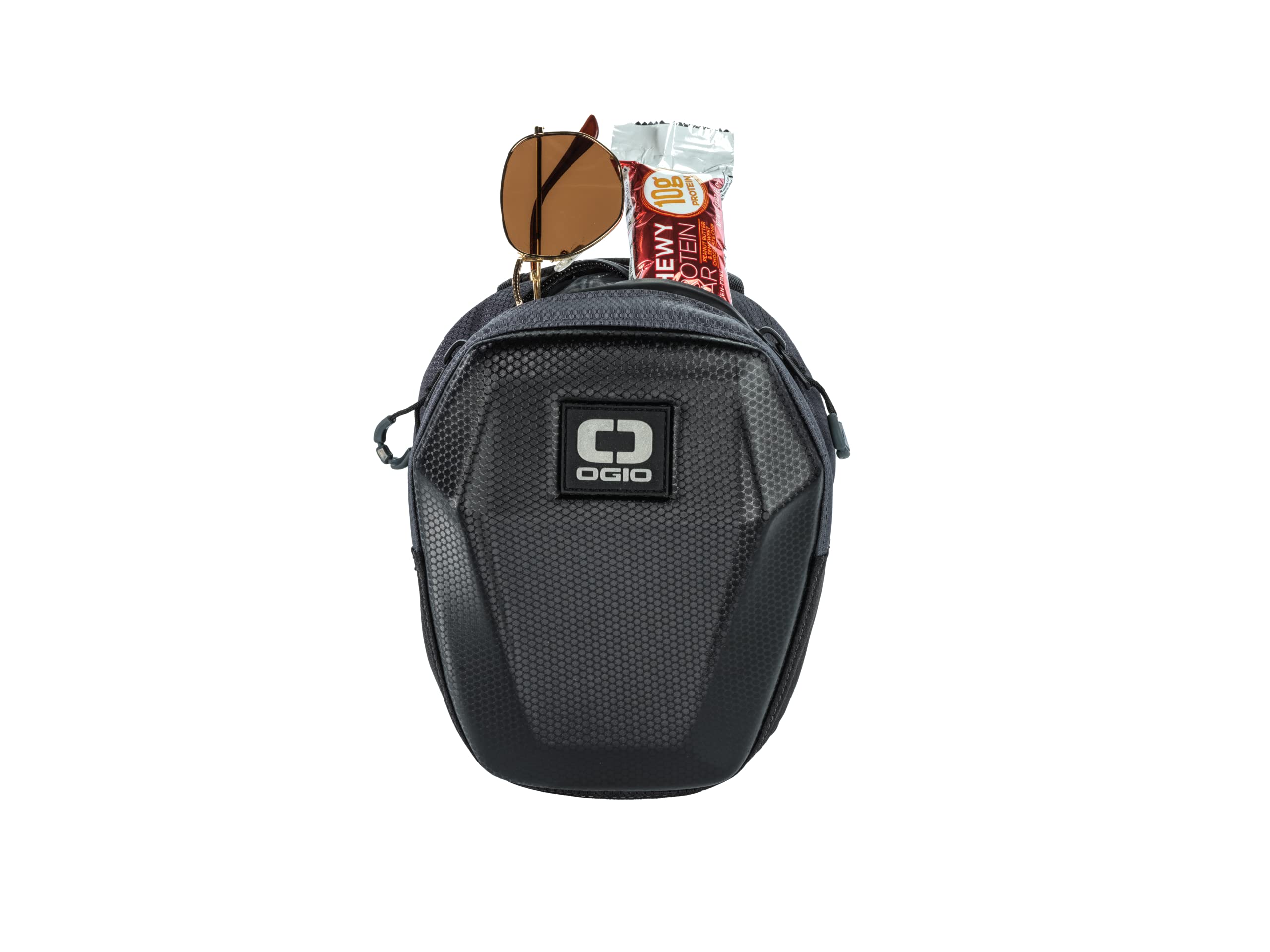OGIO molded leg bag worn on leg in lifestyle scene enables hands-free mobility