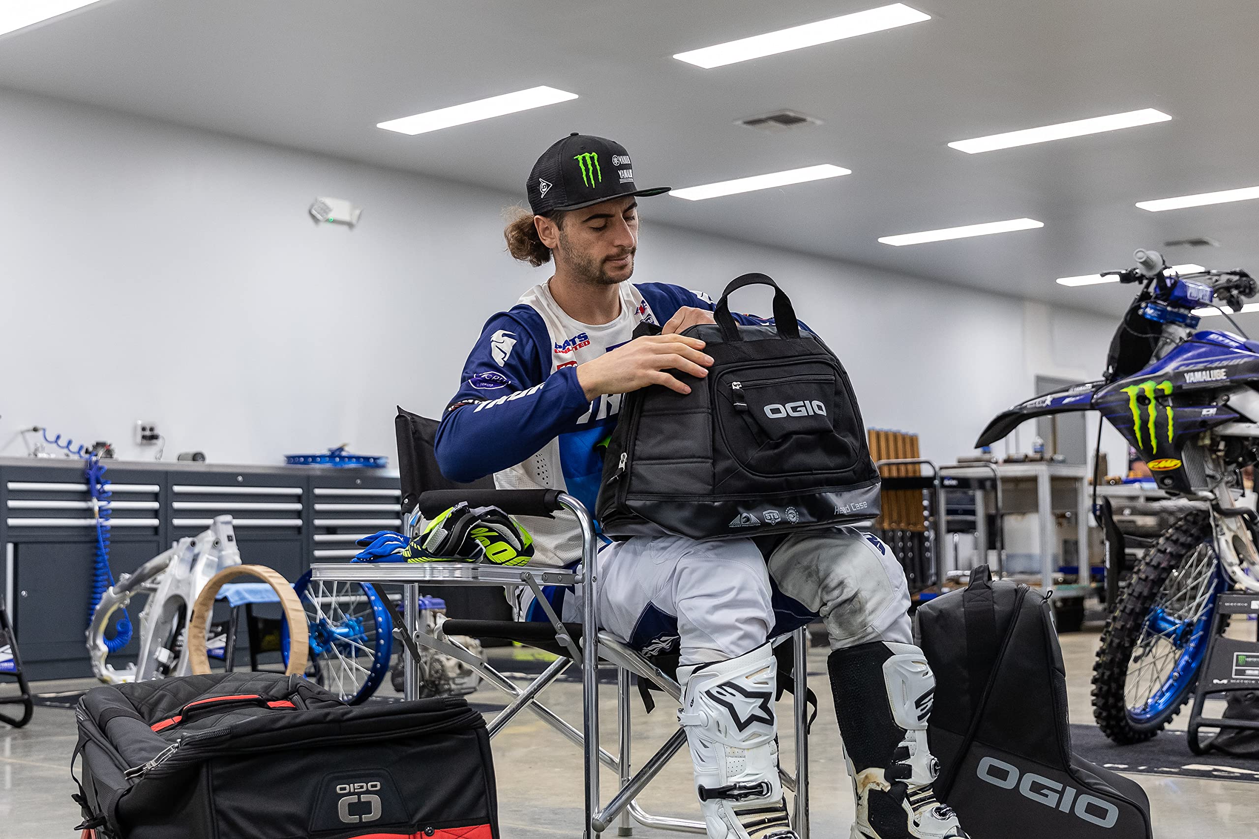 OGIO bag attached to motorcycle or in trunk, simplifies safe helmet transport