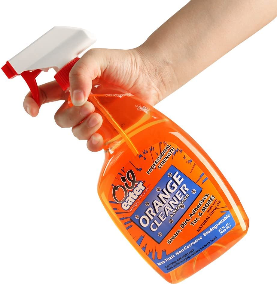 Oil Eater spray action mist covering a greasy surface for efficient treatment