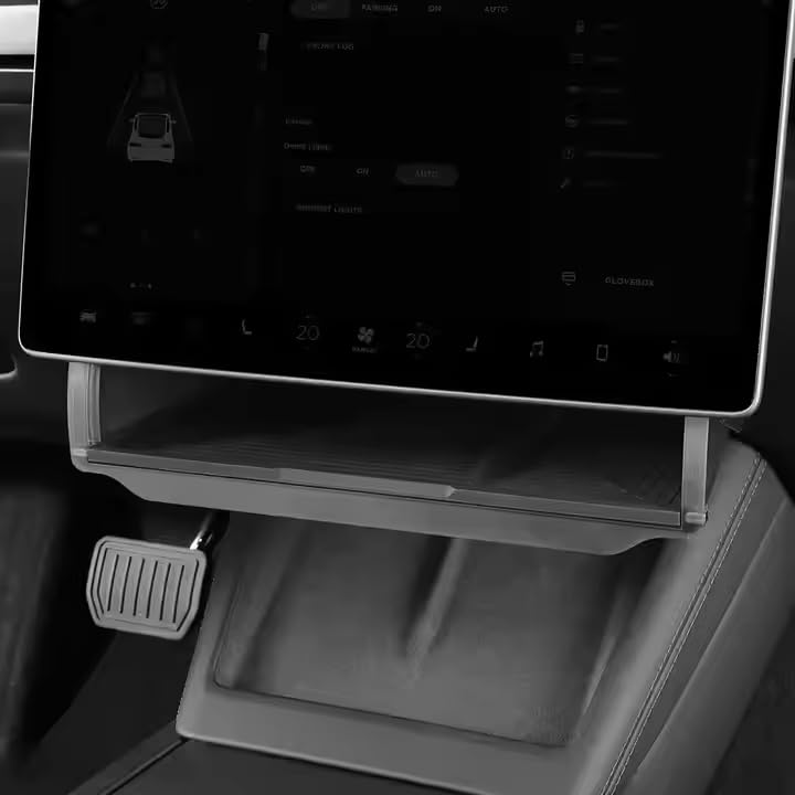 Old Rock front view installed under Tesla Model Y screen, neat organized storage