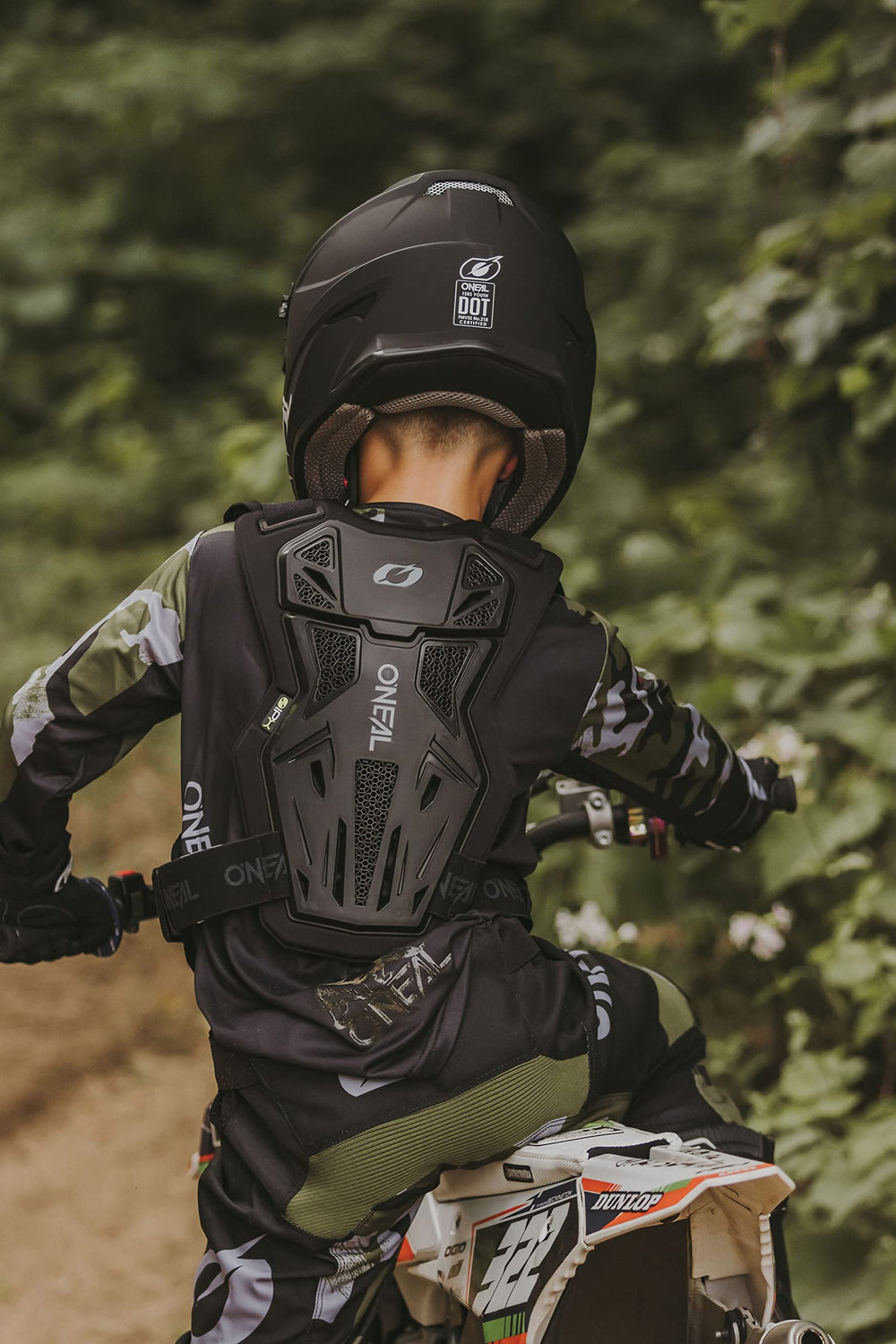 O'NEAL youth rider wearing chest protector showing mobility and lightweight protection