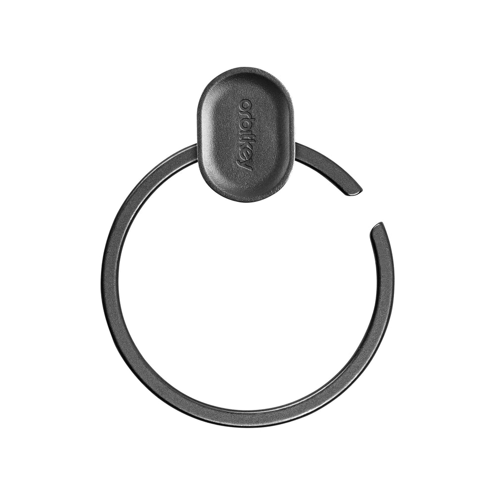 orbitkey Ring V2 on desk with everyday items showing minimalist style benefit