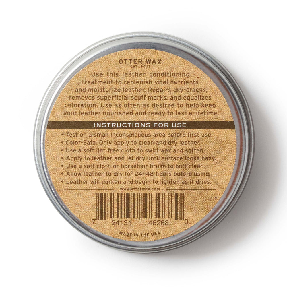 Otter Wax on a leather chair in a living room showing restoration and safe home use benefit
