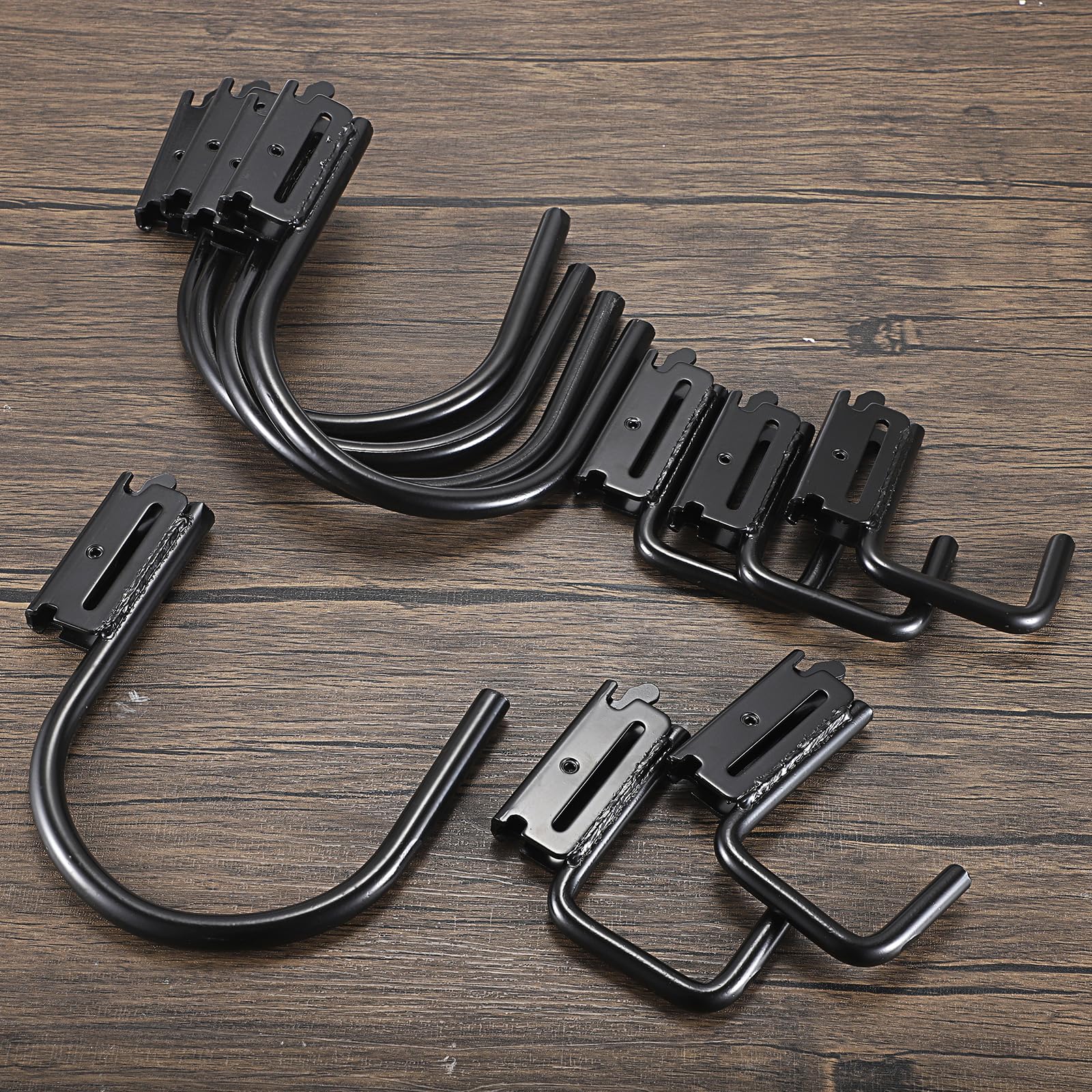 OwnMy hooks installed on trailer E-track demonstrating stable hanging
