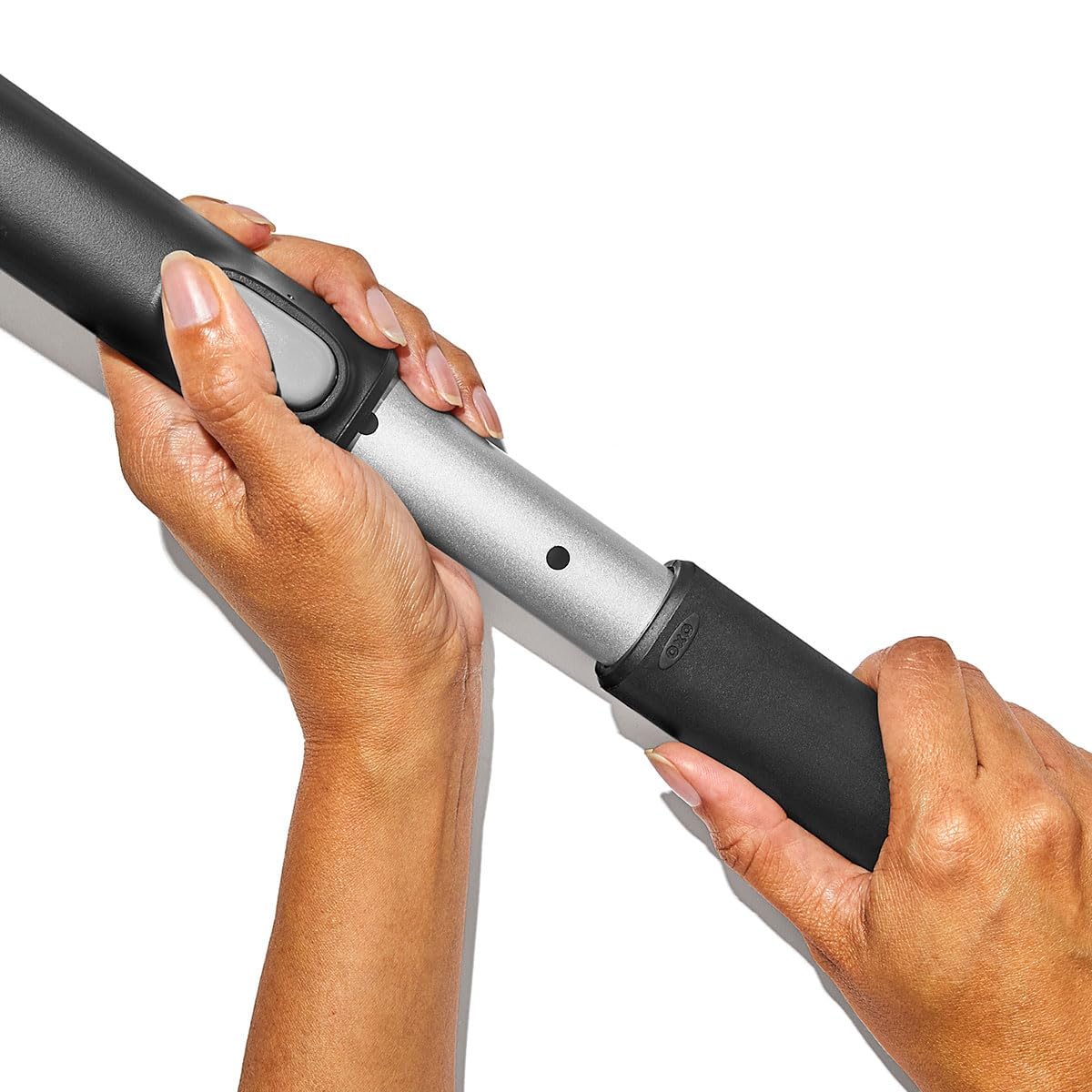 OXO brush in use clearing windshield faster and with less strain