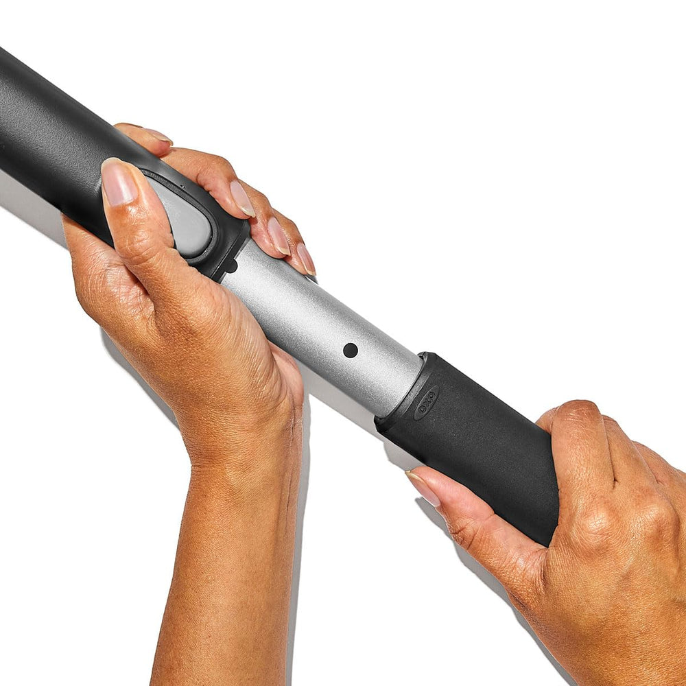 OXO brush in use clearing windshield faster and with less strain