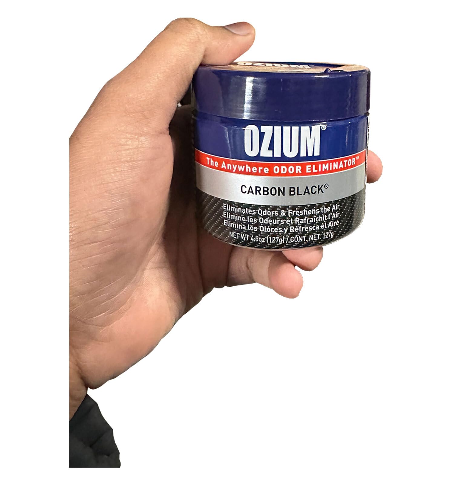 Ozium placed in car cupholder for continuous odor reduction while driving