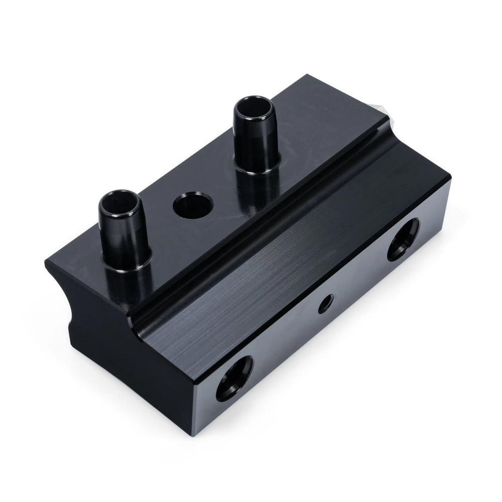 Pacific Performance Engineering valve next to ruler showing compact size and scale