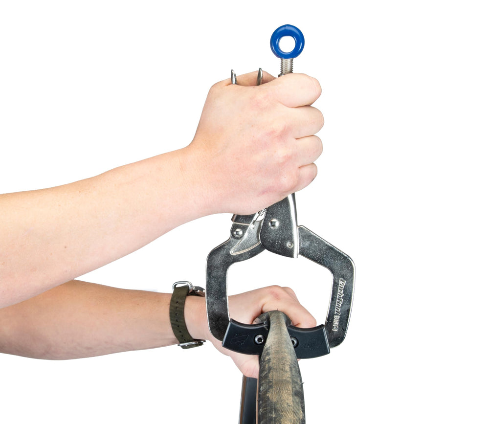 Park Tool BMT-1 in use on a tubeless wheel making bead removal easier