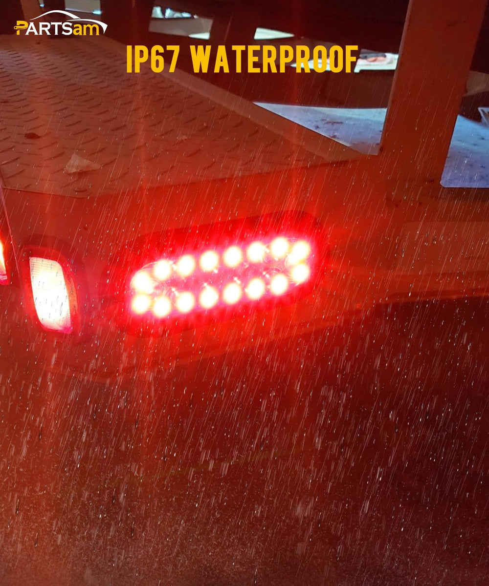 Partsam lit at night showing brake red and white reverse beams for clearer visibility
