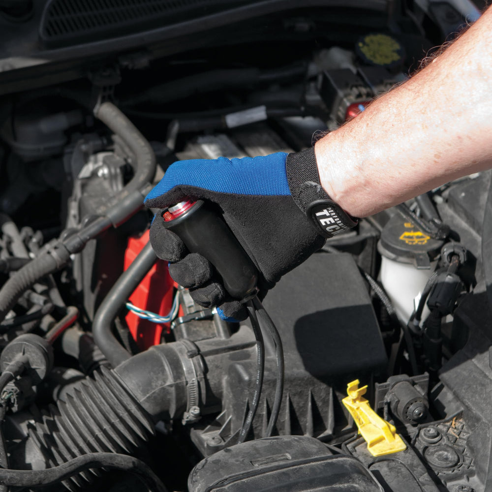 Performance Tool in-use in an engine bay enabling one-person starter crank safely