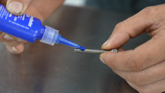 Permatex applied on bolt showing secure hold and clean localized application