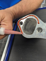 Permatex RTV applied to a valve cover demonstrating a durable formed-in-place gasket