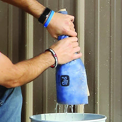 PIG mat being hand-wrung to reuse and save mats