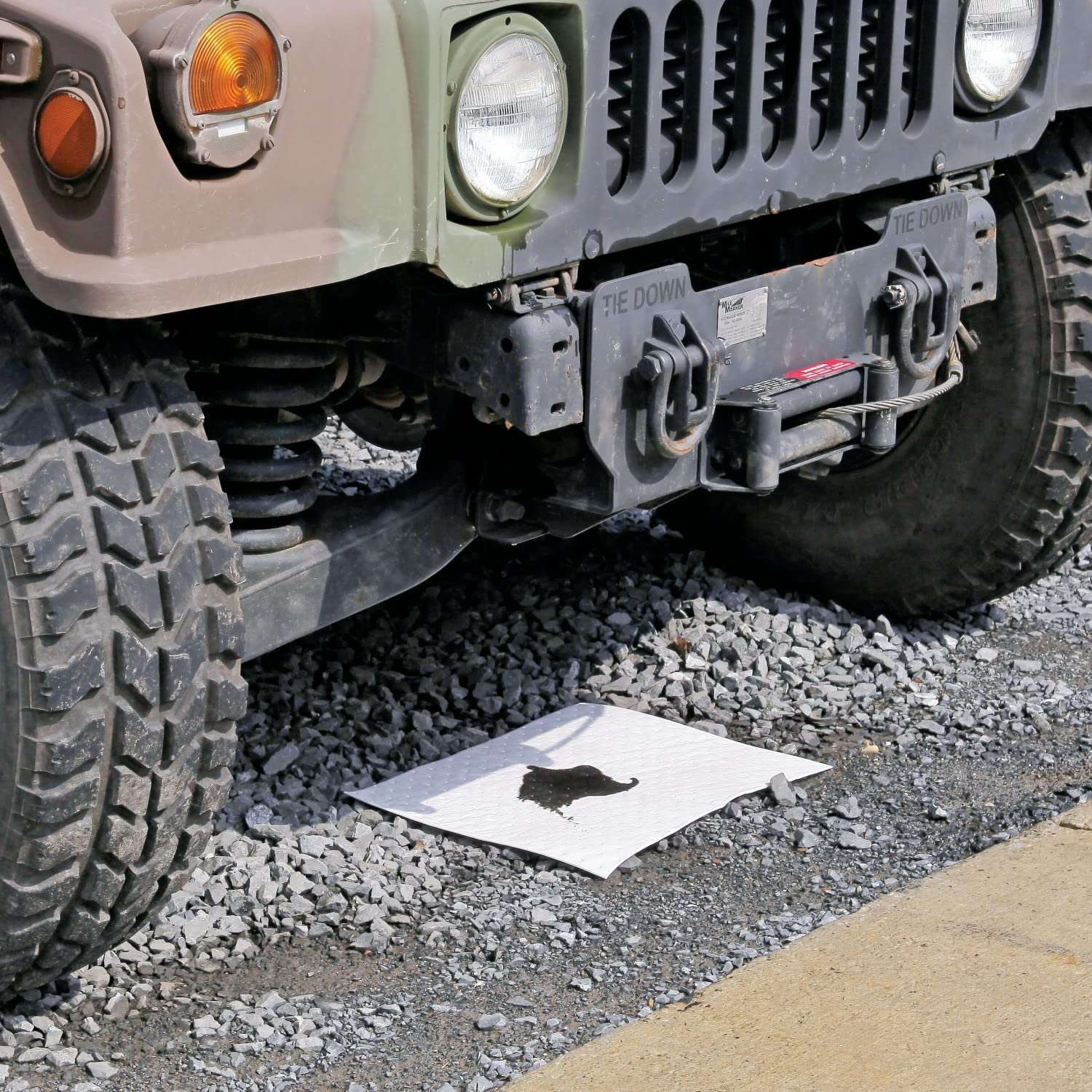 PIG mat held by hand to show size and portability for on-site response