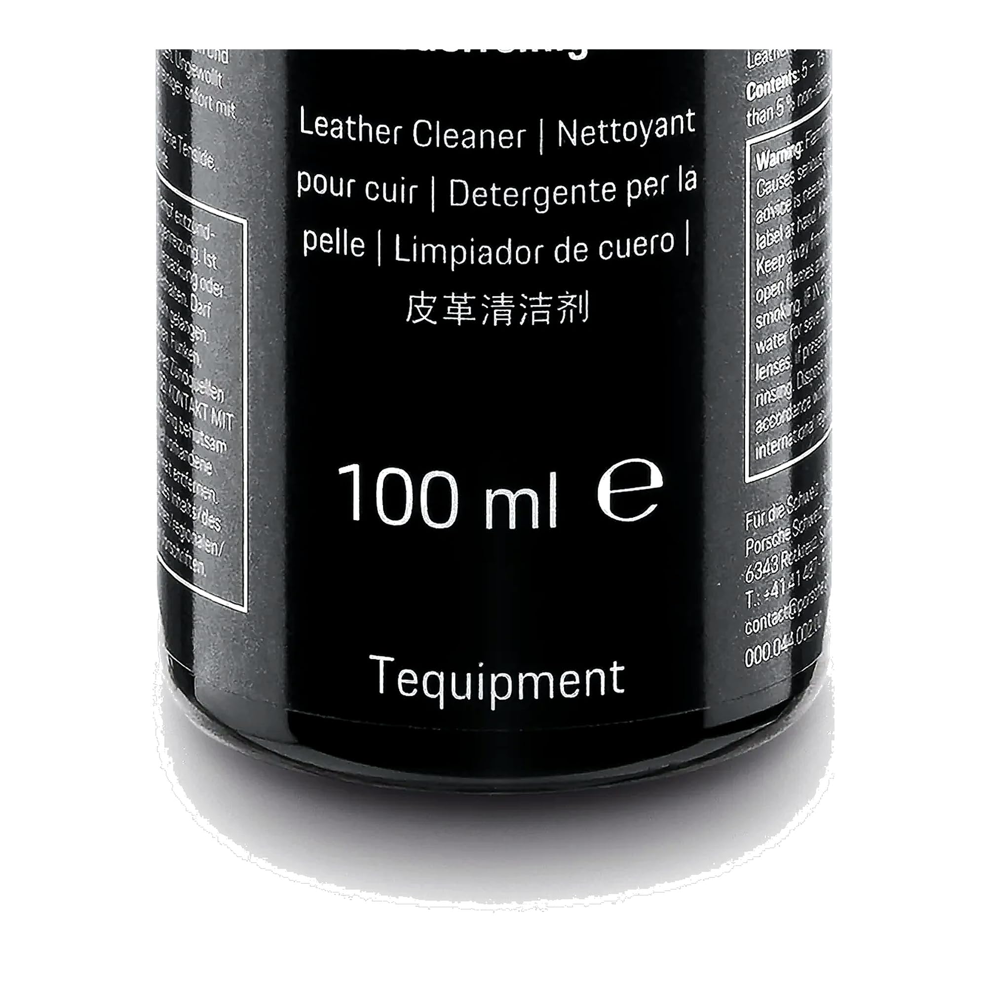 Porsche leather cleaner 100 mL next to a credit card showing compact travel-friendly size